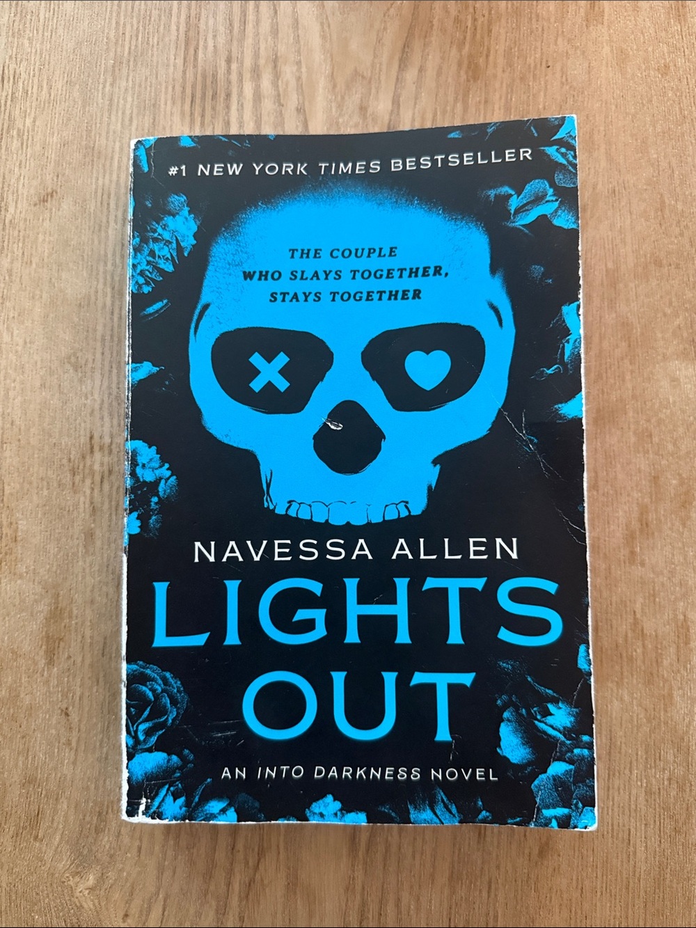 Lights Out by — Blue & Black Paperback Novel